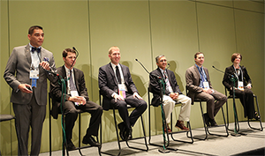 Rob Melendez, MD, MBA, leads a panel discussion during the 2014 YO Program in Chicago