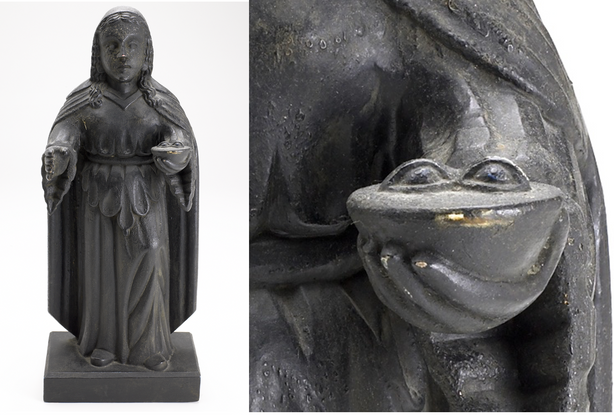 A black wooden statue of a woman in robes, and a close up shot of the platter with two eyeballs she holds in her hand. 