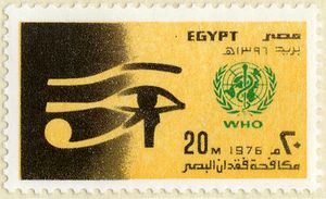 A yellow postage stamp with a stylized image of a human eye, a globe-shaped logo, and text in English and Arabic lettering. English text reads: EGYPT 1976.