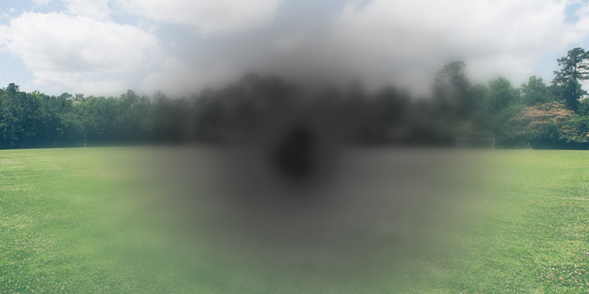 La impresión de un artista de fotografía de un punto ciegocentral y de la borrosidad circundante sobre una imagen de una pradera y un bosque.