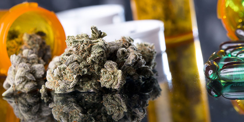 Medical marijuana and CBD oil on a table