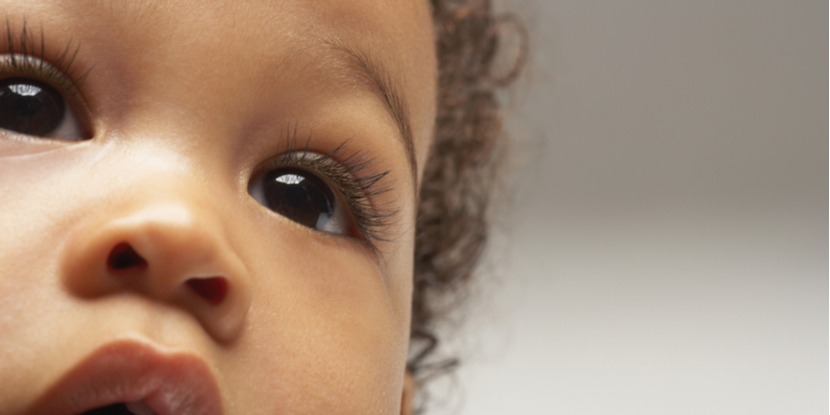Close-up image of a baby's eyes and face