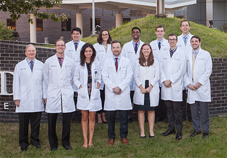 Dr. Siatkowski (pictured left) with the 2017-2018 residents at Dean McGee Eye Institute in Oklahoma City.
