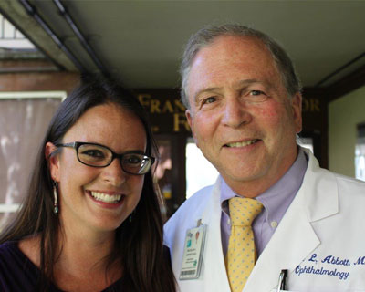 Stephanie Beaver Adler and Richard Abbott, MD, twenty years after Dr. Abbott saved her vision with corneal transplant surgeries.