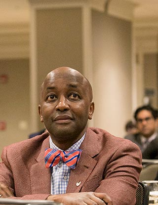 Sidney Gicheru, MD, of Dallas, listens intently during a Mid-Year Forum 2019 session.