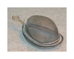 A silver-colored mesh mask made of metal. The mask has a handle and an oval mouthpiece , and there is wire mesh over the mouthpiece.