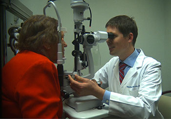 Dr. Heersink examines an EyeCare America patient.