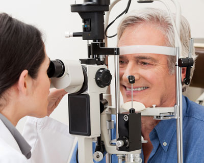 Photograph of a man getting and eye exam