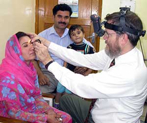 Dr. Kietzman examining a patient in Gilgit, Pakistan.