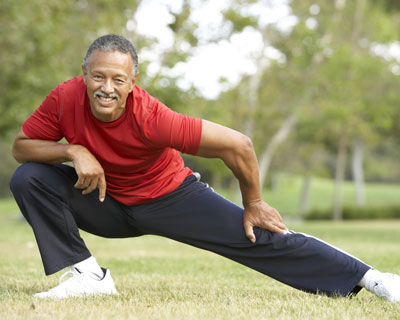 Photograph of a man stretching